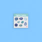 watercolor crystal sticker set for the throat chakra on blue background