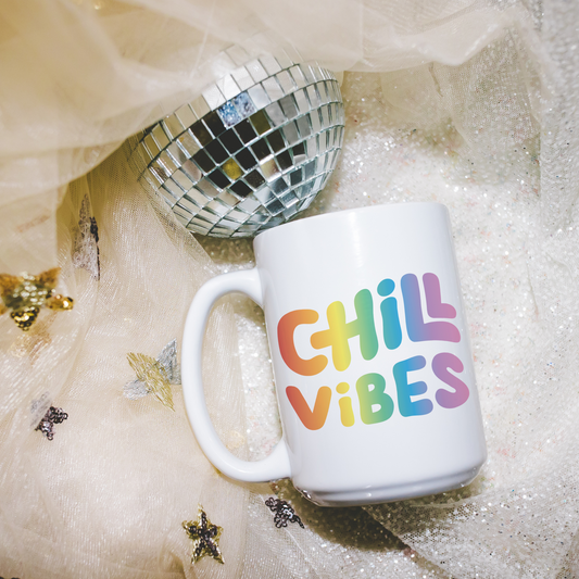 a white coffee mug with the words chill vibes on it