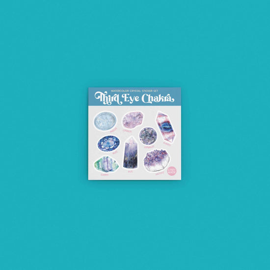 watercolor crystal sticker set for the third eye chakra on teal background