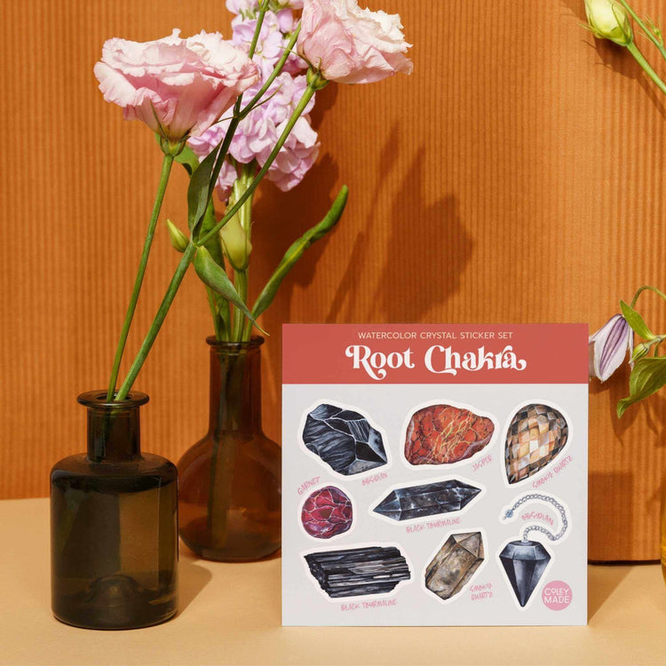 a  Root Chakra Crystal Sticker Set with a picture of crystals and flowers