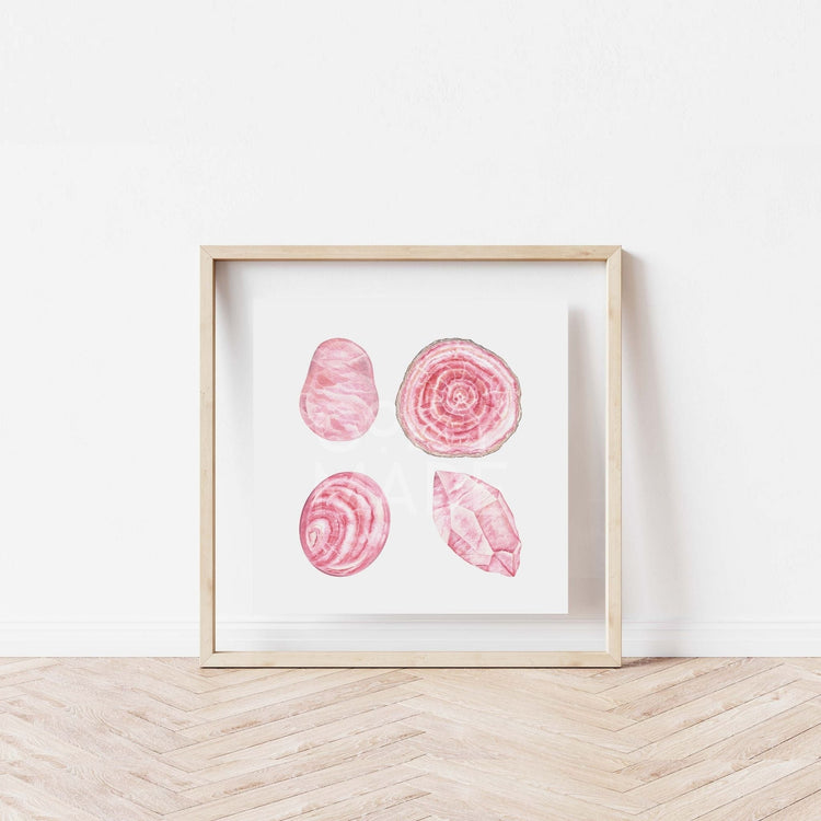 a white wall with a wooden frame holding a picture of the Love stoned Watercolor Crystal Art Print