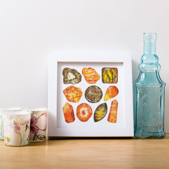 Sacral Chakra Watercolor Crystal Art Print on a shelf with vase and candles
