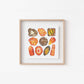 a white wall with a wooden frame holding a picture of the sacral Chakra Watercolor Crystal Art Print